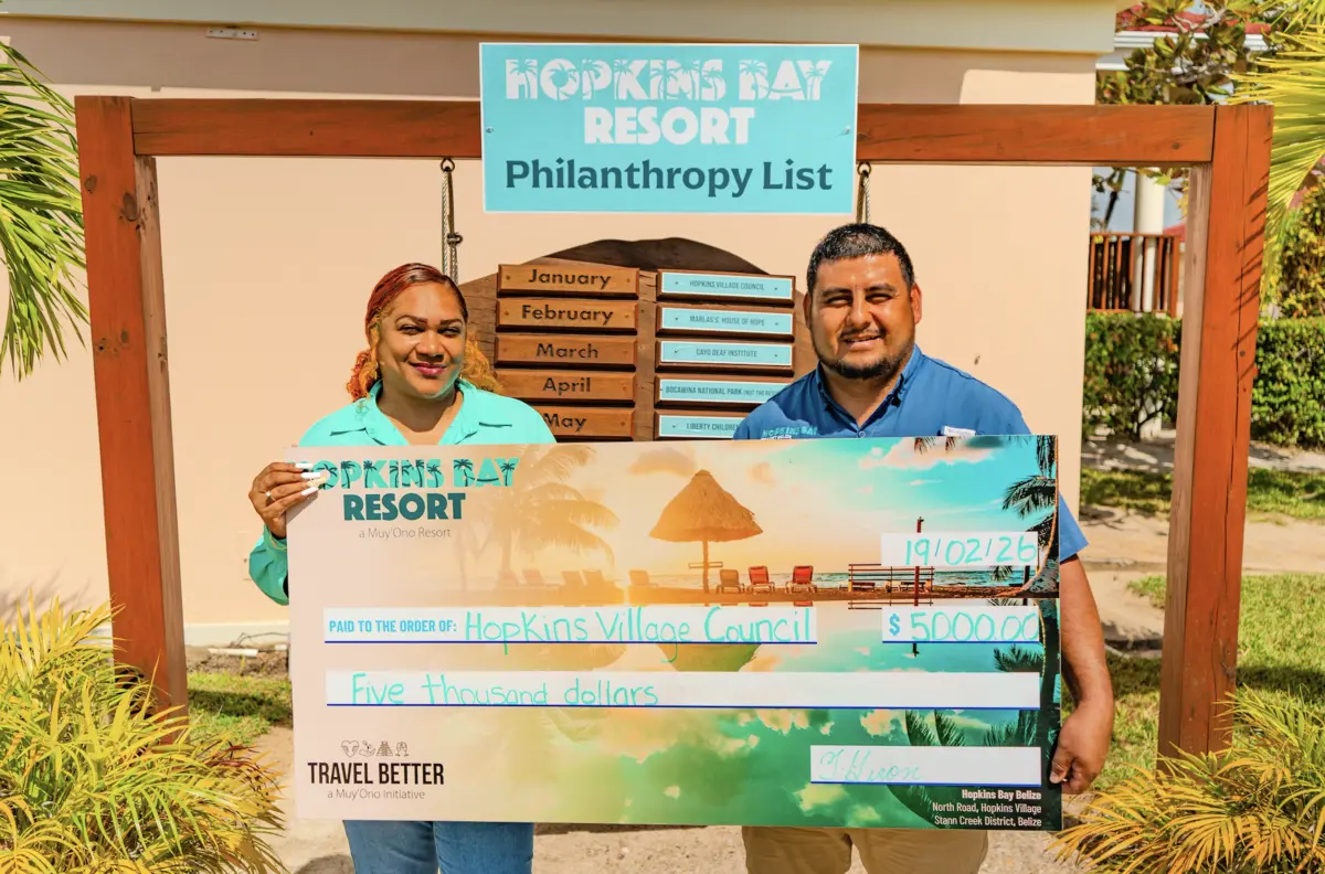 Hopkins Bay Resort presenting philanthropy donation | MuyOno Resorts