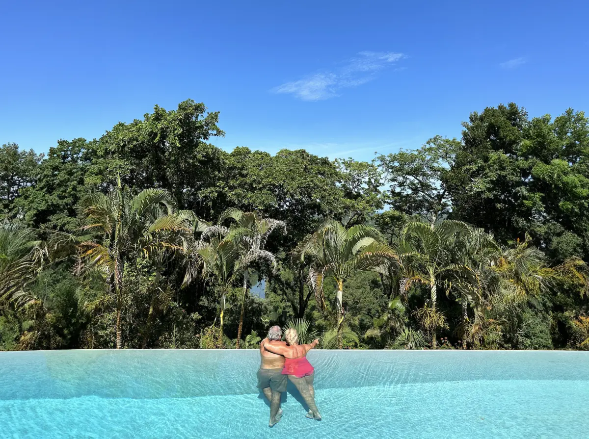 Couples in Signature Canopy Suite Pool During Off Season in Belize - MuyOno Resorts
