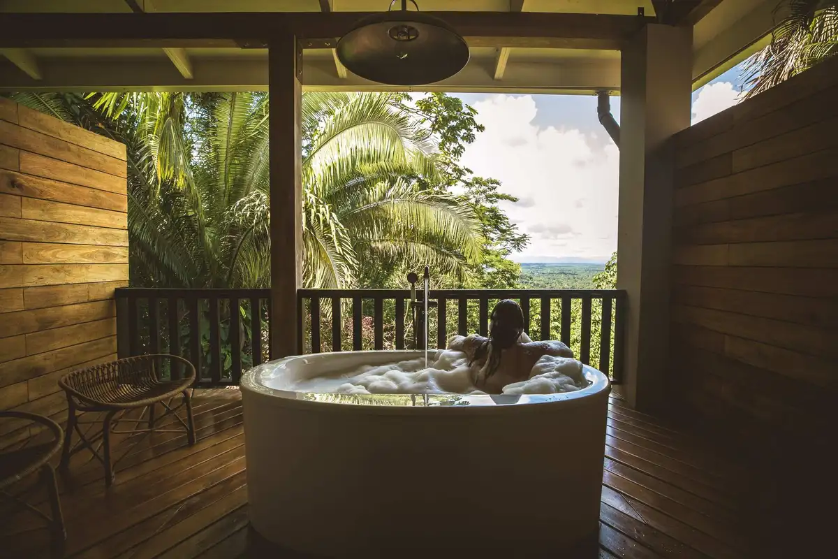 Outdoor Bathtub in Signature Canopy Suite at Copal Tree Lodge - MuyOno Resorts